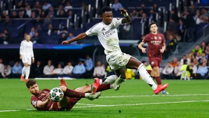 Ruben Dijas (Mančester Siti) i Vinisijus Žunior (Real Madrid)